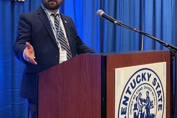 Dustin Reinstedler speaking at the 2023 Kentucky State AFL-CIO convention.      Photo by BERRY CRAIG