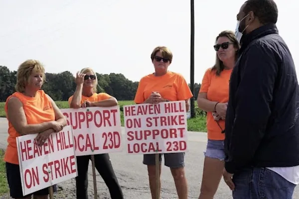 Charles Booker visits a picket line.