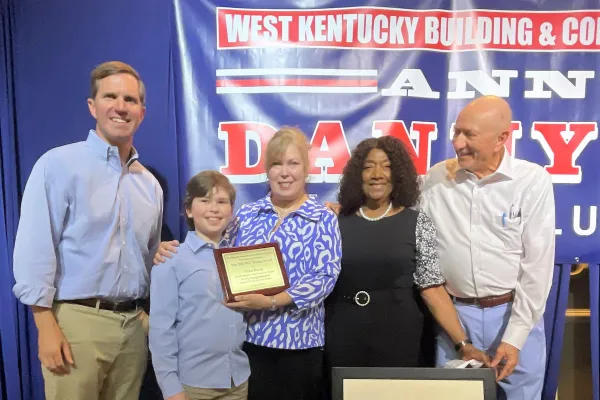 From left, Gov. Andy Beshear, Alex and Sandy Dowdy Lewis, Carol Young and Larry Sanderson. Photo by BERRY CRAIG,