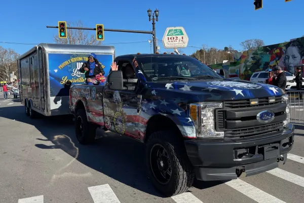 UAW truck and trailer led the union contingent. Photo by BERRY CRAIG