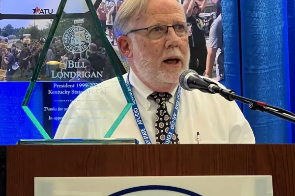 Bill Londrigan with his special "dedicated leadership award" presented at last year's state convention. Photo by BERRY CRAIG