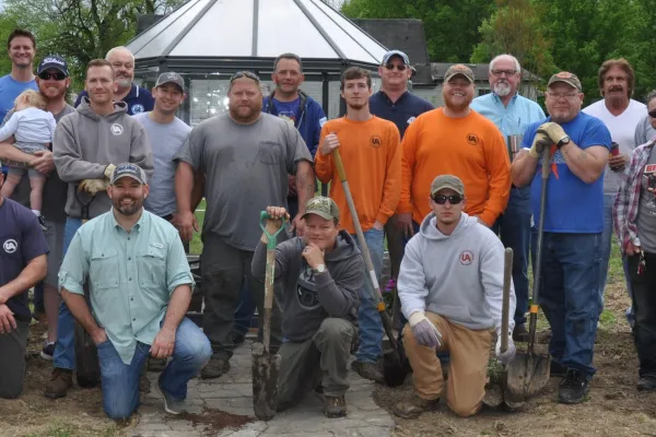 bryant_hileman_back_row_center_poses_with_most_of_the_union_volunteeers_who_helped_with_the_tree_planting.jpg