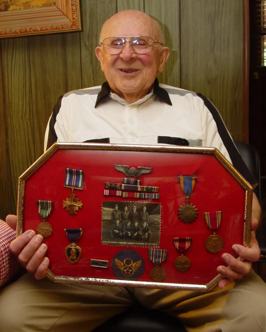Bill Hack and his medals.      Photo by BERRY CRAIG